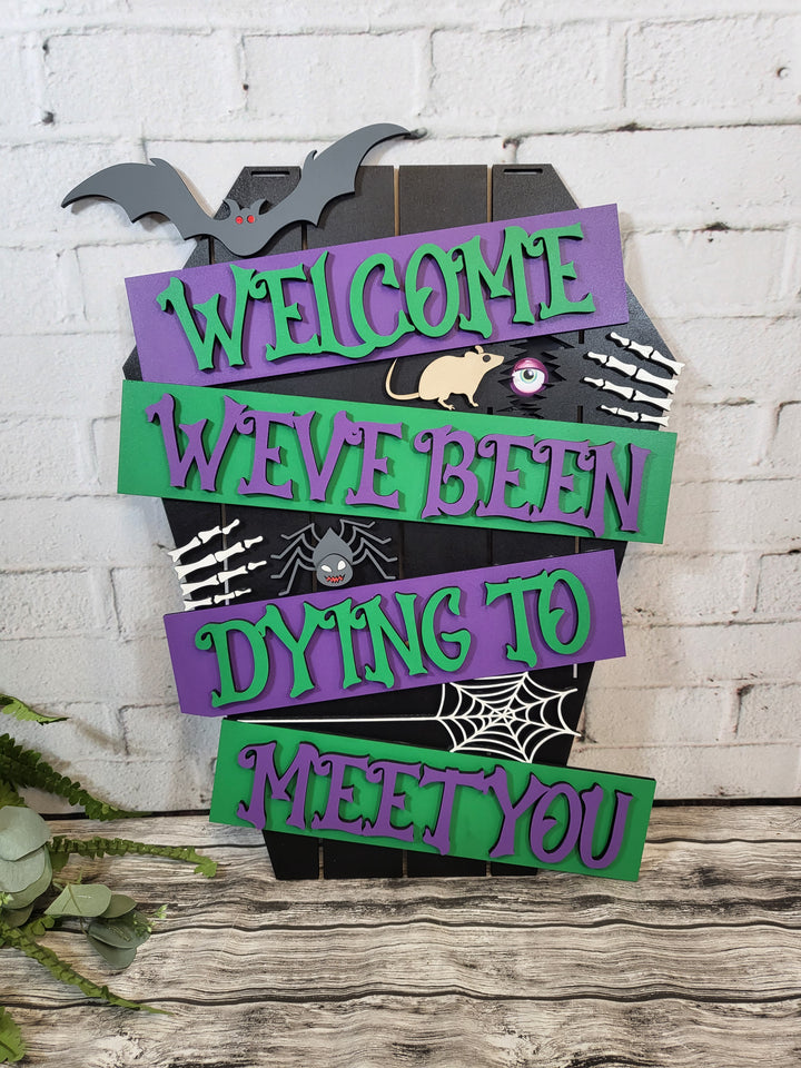 Welcome We've Been Dying to Meet You Door Hanger - Finished