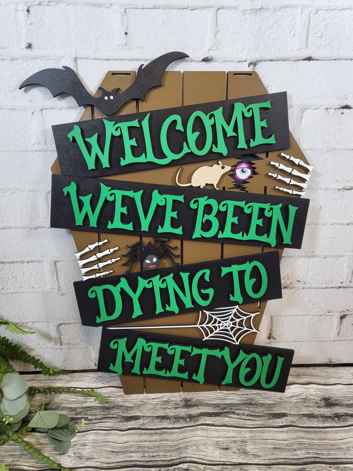 Welcome We've Been Dying to Meet You Door Hanger - Finished